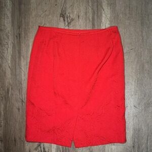 Red floral midi skirt with zipper and button closure. Size: 14